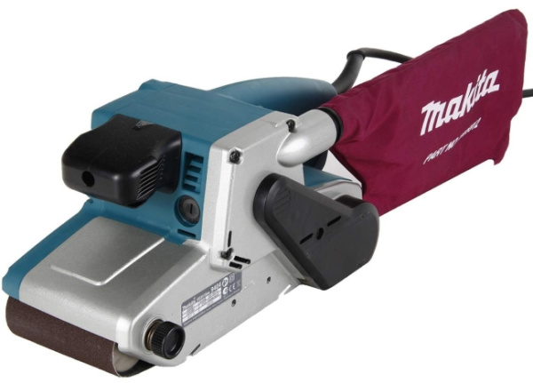 Ленточная шлифмашина MAKITA 9404 ,1010Вт,100х610мм,210-440м/м,4.7кг,кор,п/сборник
